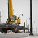 A crane operator works on the East Stadium bridge on Tuesday. Daniel Brenner I AnnArbor.com